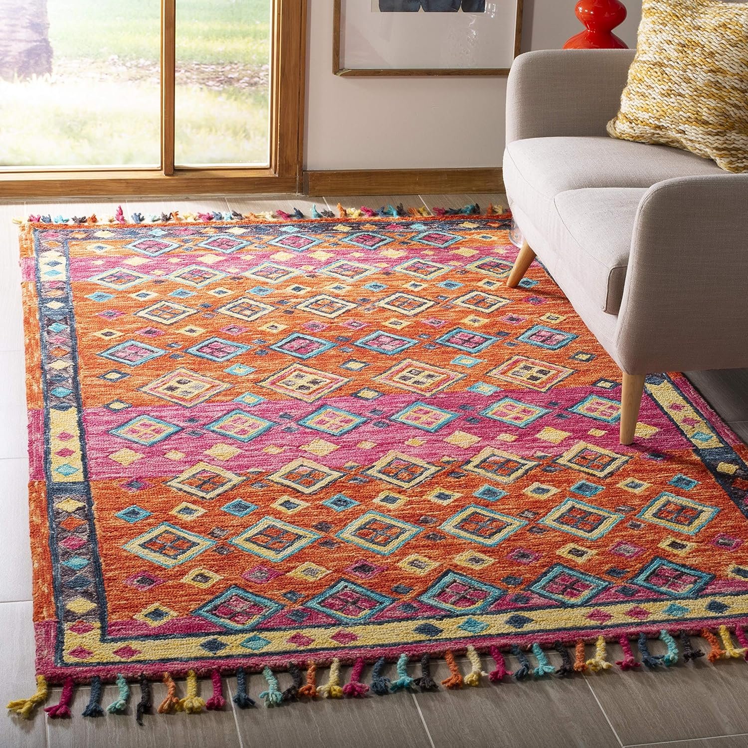 SAFAVIEH Aspen Collection Accent Rug – 3′ x 5′, Orange & Fuchsia, Handmade Boho Braided Tassel Wool, Ideal for High Traffic Areas in Entryway, Living Room, Bedroom (APN138A)