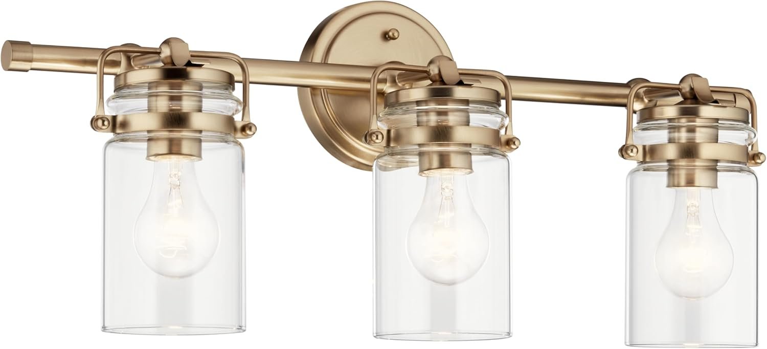 Kichler Brinley 24″ 3-Light Bathroom Vanity Light Fixture with Clear Glass in Champagne Bronze, Modern Farmhouse Mason Jar Style for Mirror Lighting (24″ W x 10.25″ H), 45689CPZ